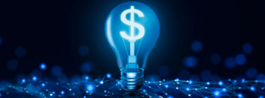 Lâmpada com cifrão, simbolizando a importância da governança de talentos para bancos e fintechs.