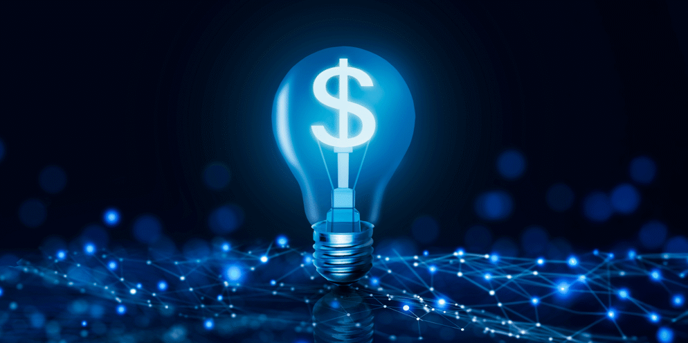 Lâmpada com cifrão, simbolizando a importância da governança de talentos para bancos e fintechs.